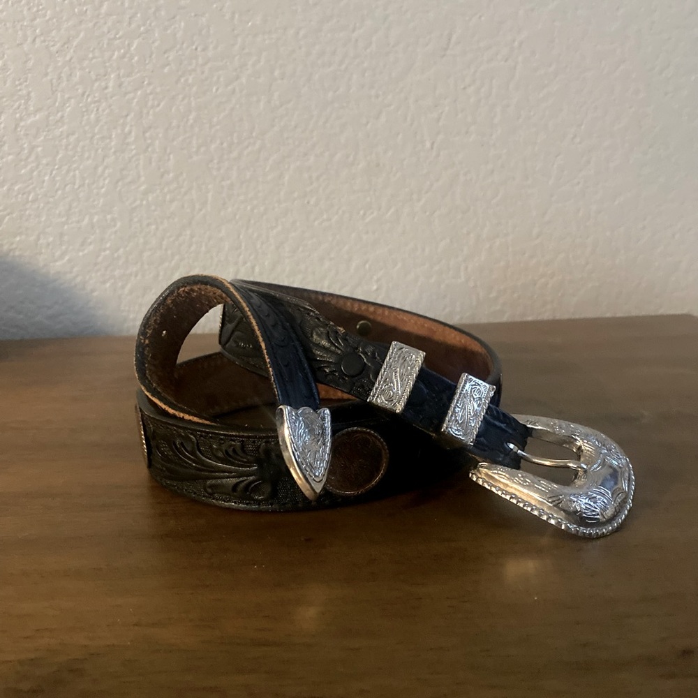 Black leather rodeo belt.